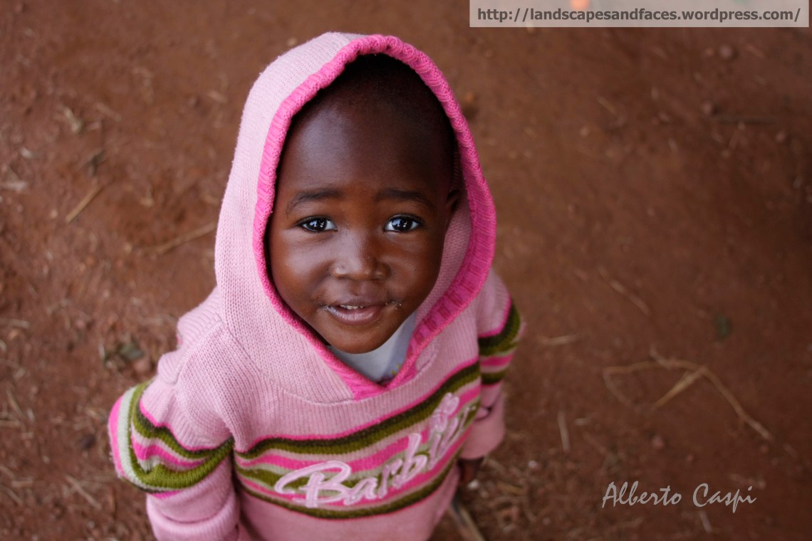 Little girl living next to school visited and curious